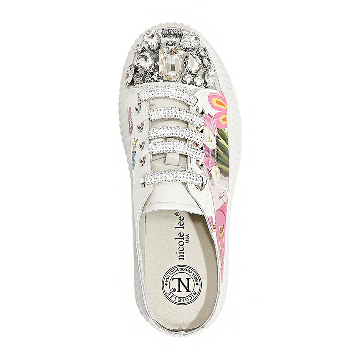 A VIEW FROM ABOVE TO OF OUR VIOLET BLOSSOM MULE PLATFORM SNEAKERS  . WHITE COLOR WITH WHITE LACES EMBELLISHED WITH RHINESTONES.