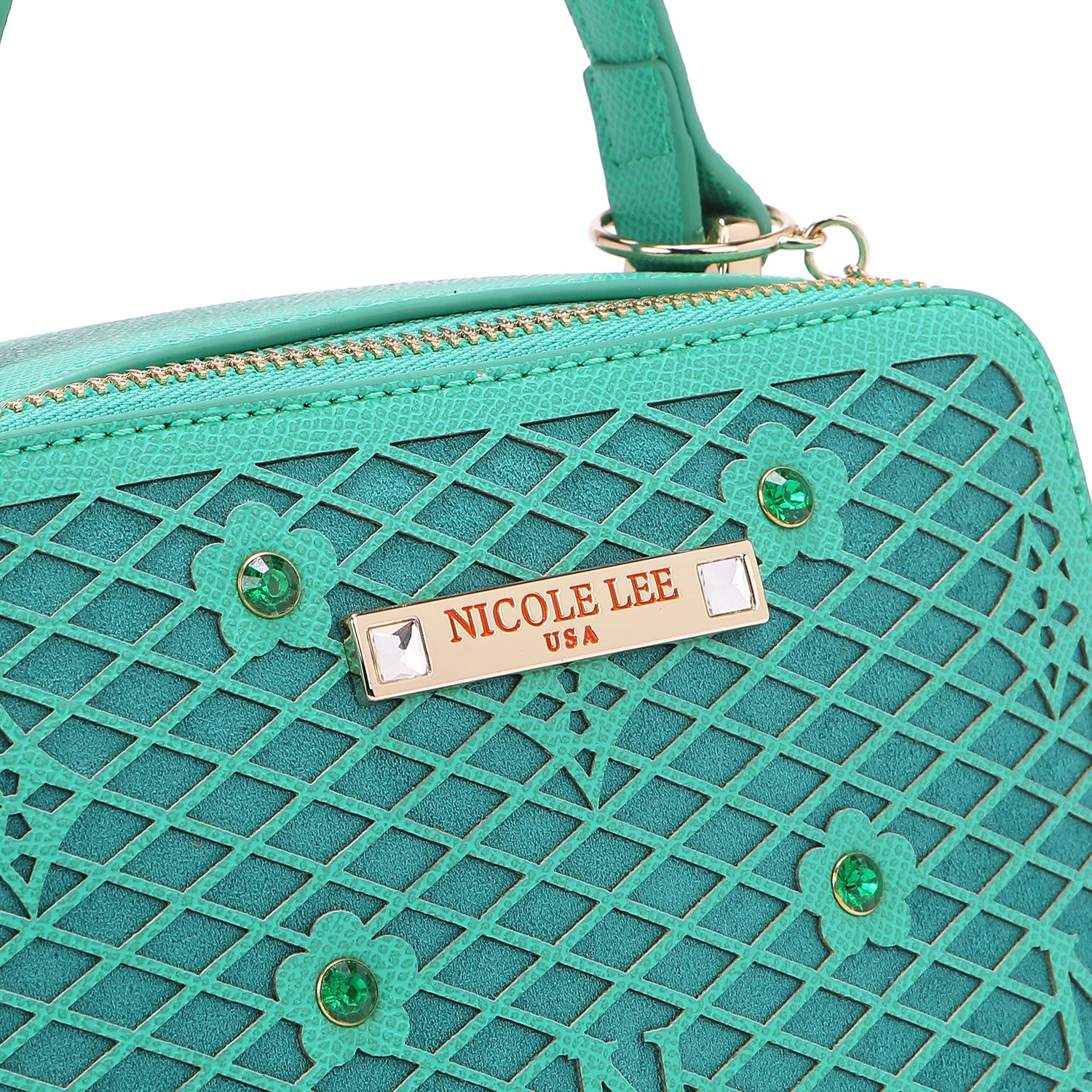 CLOSER LOOK TO THE NICOLE LEE FRONT PLAQUE.