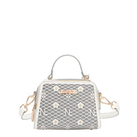 OUR MINI HANDBAG WITH LACER-CUT AND RHINESTONES DETAILS IN COLOR WHITE WITH STRAP.