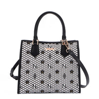 OUR GRACIE STRUCTURED TOTE WITH LACER-CUT AND RHINESTONES DETAILS IN COLOR BLACK WITH STRAP.