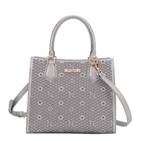 OUR GRACIE STRUCTURED TOTE WITH LACER-CUT AND RHINESTONES DETAILS IN COLOR PEWTER WITH STRAP.