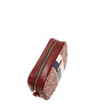 GEOMETRIC LASER CUT CROSSBODY BAG