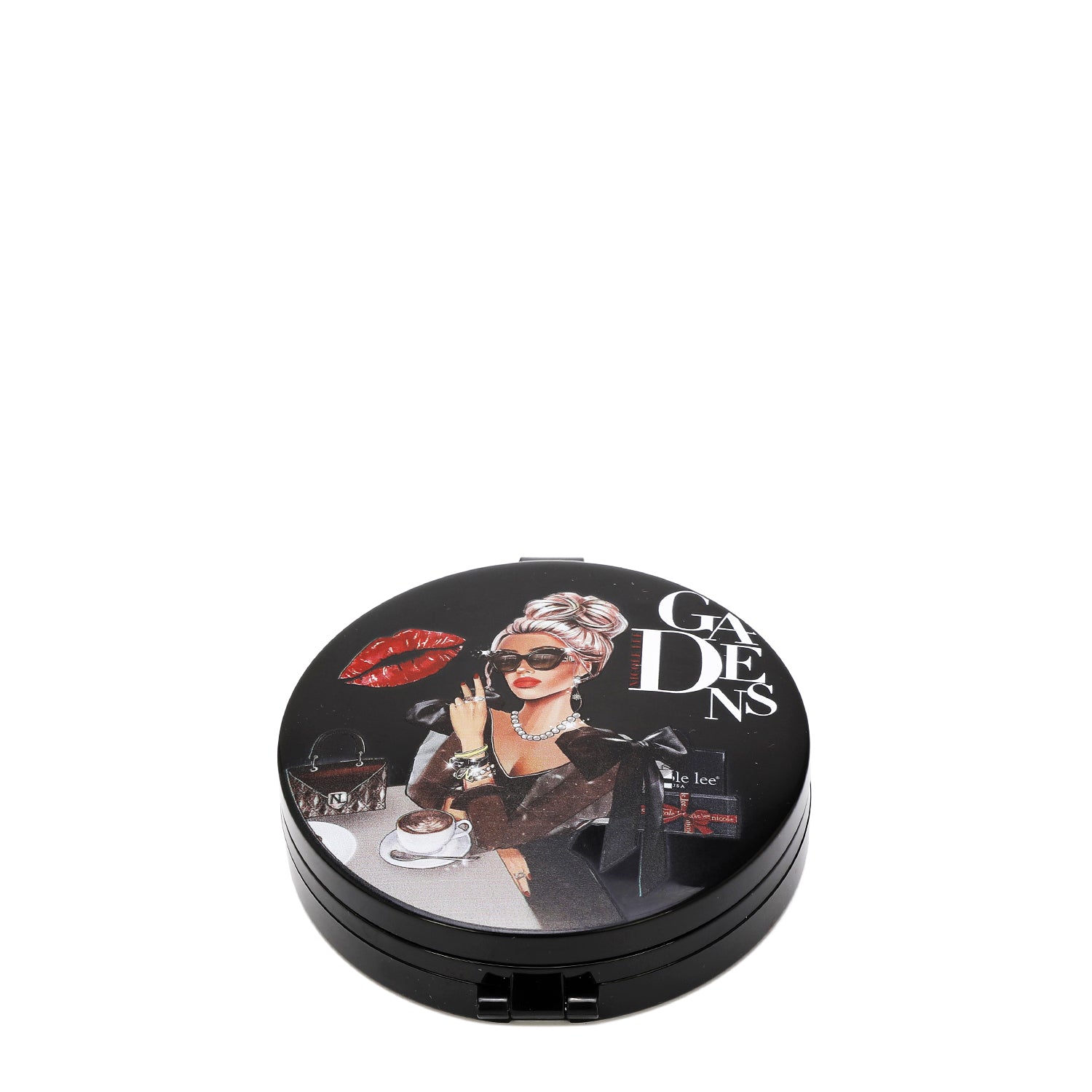 ROUND COMPACT MIRROR WITH OUR LADY IN BLACK DESIGN.  A WOMEN SITTING IN A TABLE  WITH A NICOLE HANDBAG AND A CUP OF COFFEE. WEARING AN ELEGANT  BLACK DRESS  WITH SUNGLASSES. A BLACK BACKGROUND WITH A RED KISS AND NICOLE LEE GIFTS.