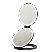 HAS DOUBLE  MIRROR ,IT HAS LED LIGHTING THAT SURROUNDS EACH MIRROR WITH A SENSOR.