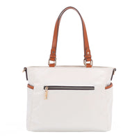 THE BACK OF OUR MARGOT TOTE BAG WITH BACK ZIP POCKET.