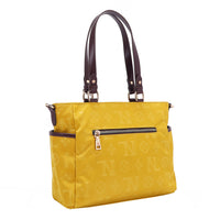 THE BACK OF OUR MARGOT TOTE BAG WITH BACK ZIP POCKET.