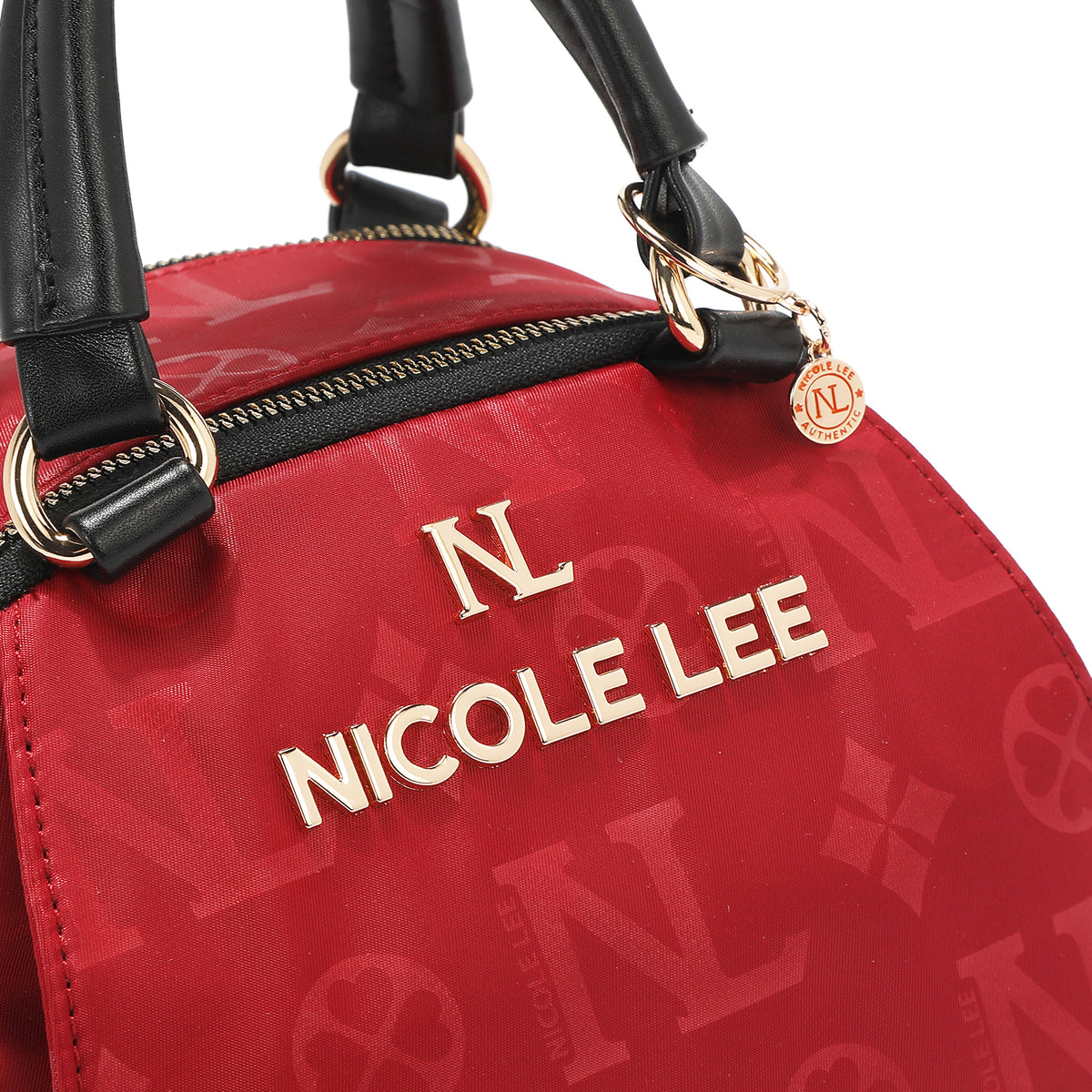 OUR NICOLE LEE LOGO HARDWARE LETTERING. GOLD-TONE HARDWARE.