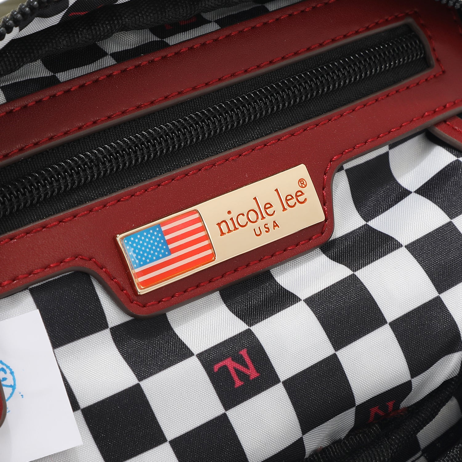 OUR INTERIOR NICOLE LEE LOGO WITH CHECKERED POLYESTER PRINT.