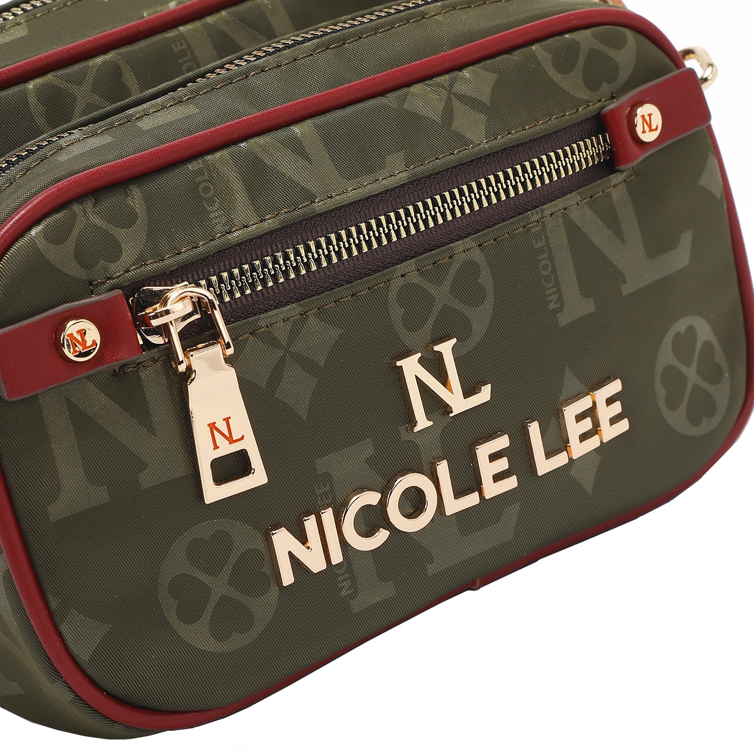 OUR NICOLE LEE LOGO HARDWARE LETTERING AND ENGRAVED ZIPPER PULLS.