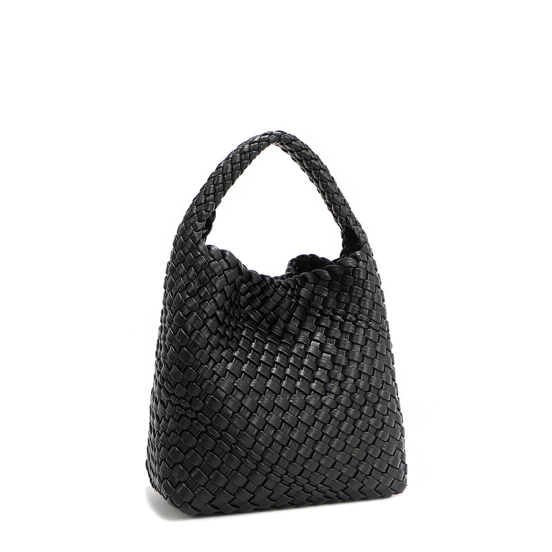 Back angle of Juni handbag crafted in braided vegan leather in classic, timeless black with a top handle (5" drop) and open slip compartment secured with a magnetic snap closure. Slouchy, relaxed silhouette offers a chic and laid-back yet refined look.