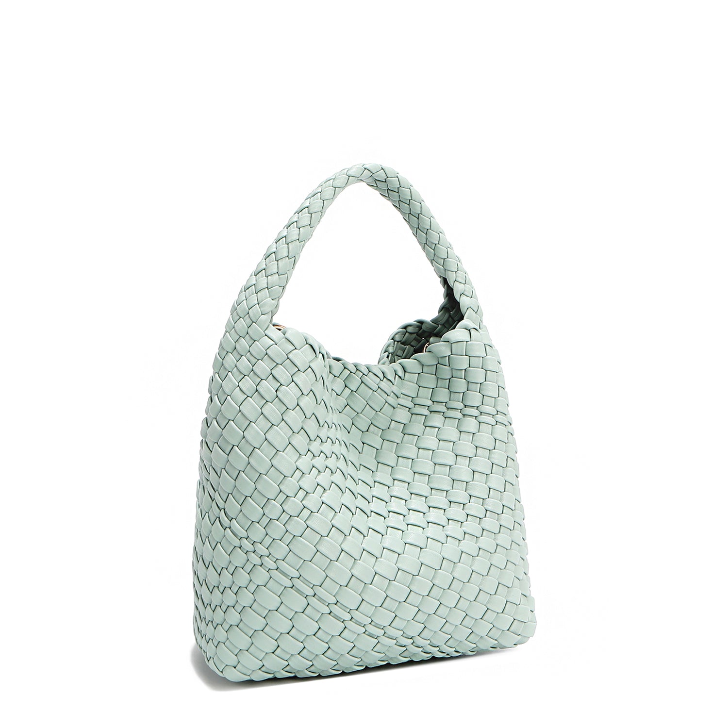 Back angle of Juni handbag crafted in braided vegan leather in pastel, dusty blue with a top handle (5" drop) and open slip compartment secured with a magnetic snap closure. Slouchy, relaxed silhouette offers a chic and laid-back yet refined look.