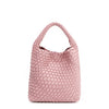 Juni handbag crafted in braided vegan leather in pastel, dusty pink with a top handle (5" drop) and open slip compartment secured with a magnetic snap closure. Slouchy, relaxed silhouette offers a chic and laid-back yet refined look.