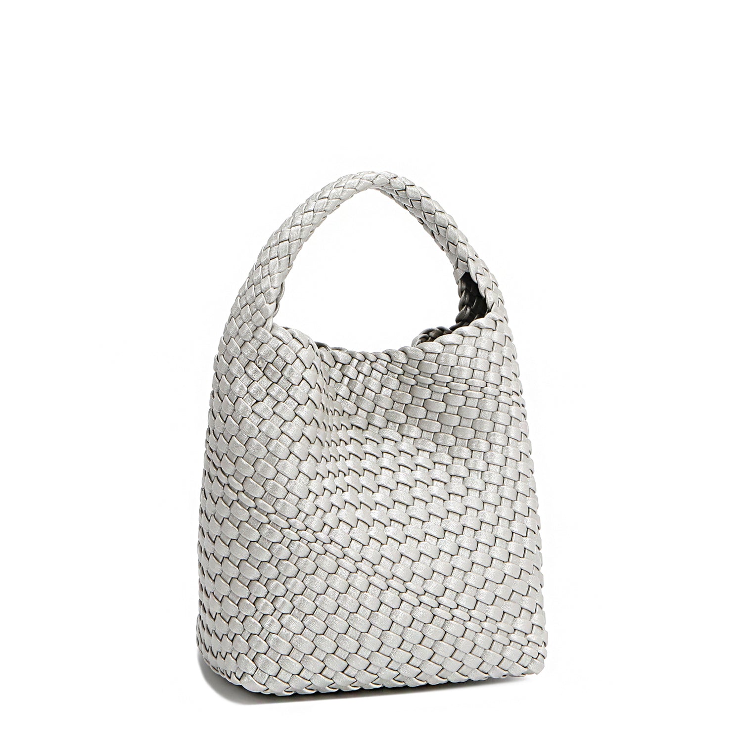Front angle of Juni handbag crafted in braided vegan leather in metallic silver with a top handle (5" drop) and open slip compartment secured with a magnetic snap closure. Slouchy, relaxed silhouette offers a chic and laid-back yet refined look.