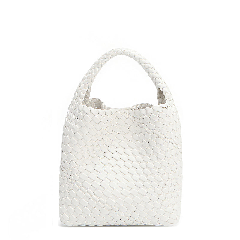 Juni handbag crafted in braided vegan leather in classic, timeless white with a top handle (5" drop) and open slip compartment secured with a magnetic snap closure. Slouchy, relaxed silhouette offers a chic and laid-back yet refined look.