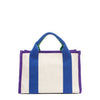 Back of the Rowan bag by Nodu Nadu by Nicole Lee. A bold mix of colors like vivid green, electric blue and vibrant purple trim evoke a sense of fun and lots of personality to mix and match your style. Dual top handles with a 3" drop allow you to carry this statement bag by the top handles. Pictured in classic beige that compliments any look, regardless of the season. 