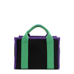Back of the Rowan Nodu Nadu by Nicole Lee handbag with green and purple trim and strap accents. Made of sturdy, lightweight, and durable canvas/polyester and designed to compliment any look, from day to night, regardless of the season!