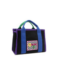 Front angle of the small Rowan polyester bag with bold color-block trim and mix-and-match straps—because your style deserves options! Available in classic black with bold blue and purple accents and a checker print smiley face adorned embroidered logo patch on the front. 