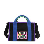 The Rowan bag by Nodu Nadu by Nicole Lee. A bold mix of colors like vivid green, electric blue and vibrant purple trim evoke a sense of fun and lots of personality to mix and match your style. Dual top handles with a 3" drop allow you to carry this statement bag by the top handles or wear it across the body thanks to the optional, adjustable black shoulder strap! 