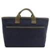 Solid back of the Emery Nodu Nadu tote bag in classic navy blue with moss green trim and dual straps. An open slip compartment in the back allows you to store items like your keys, journal, and more for convenient access. Rectangular silhouette for a classic, timeless feel. 
