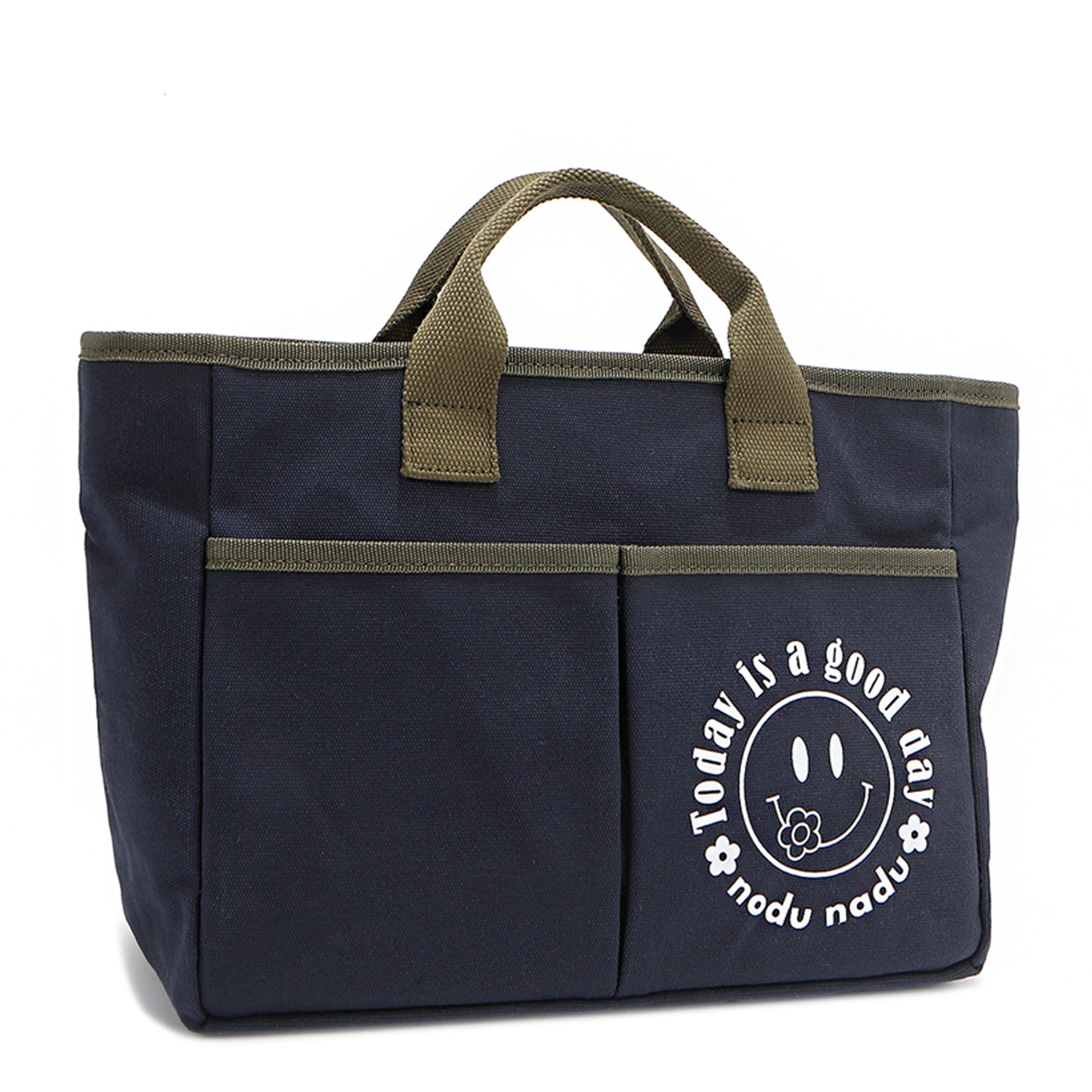 With sleek trim details and a feel-good message, this everyday tote is here to remind you that yes, today (and every day) is a good one. Designed for both style and function, it features plenty of compartments like 2 front slip pockets. Front angle pictured in classic navy blue with moss green trim and straps. White smiley face adorns the front with a cute little flower on its smile in this rectangular silhouette. 