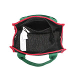The Nodu Nadu Marley Bag top angle in Black has a main zip top closure that opens up to reveal an interior back slip pocket and a structured rectangular base. 