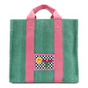 Your must-have carryall for school, weekends, and everything in between! Designed with a soft, relaxed silhouette, the Nodu Nadu Sawyer in Green offers plenty of space to keep notebooks and loose essentials effortlessly organized—so you're always ready to grab and go! Light green-colored canvas paired with baby pink strap accents. 