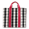 Black gingham back side of the Nodu Nadu Blair Bag – minimalist and structured canvas tote with pink handles. Perfect and spacious for everyday wear with a rectangular silhouette and webbed dual straps. 