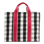 Black gingham back side of the Nodu Nadu Blair Bag – minimalist and structured canvas tote with pink handles. Perfect and spacious for everyday wear with a rectangular silhouette and webbed dual straps. 