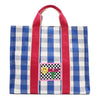 Blue and white checkered Nodu Nadu Blair Bag front – features hot pink straps and a retro-inspired logo stitched patch with checker print and smiley face. 