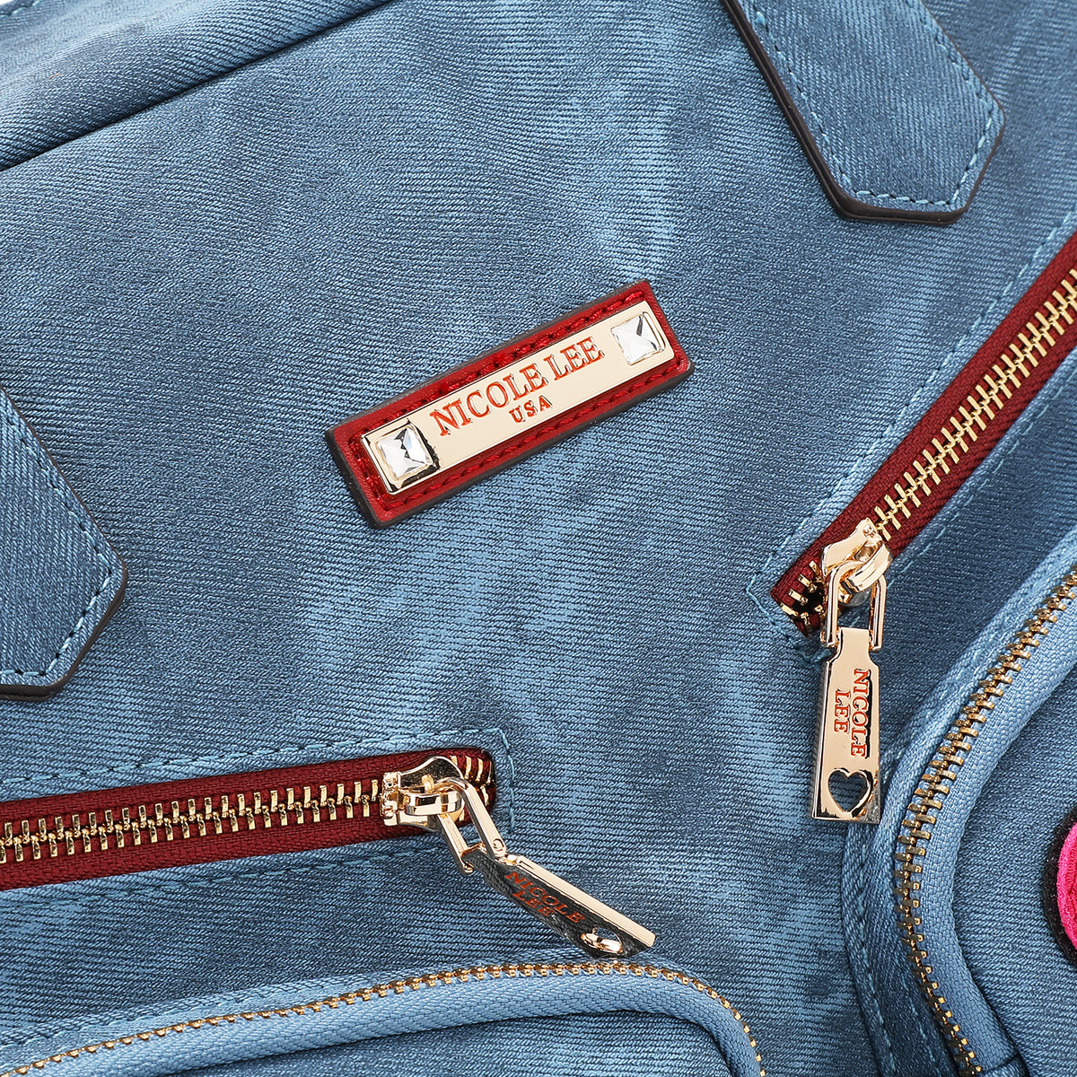 MULTI PATCH ZIPPER BAG