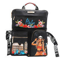 The front has 3 compartments, 1 on top and 2 below, all black background. The first one says "Italy" with colorful flowers. The bottom 2, one shows part of the colosseum in Rome Italy and leaning tower of Pisa., and the other shows a blonde girl with a cup on her hand. Side and bottom straps with snap buttons