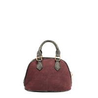 Back of the vegan leather the Queen dome-shaped crossbody, part of THE QUEEN 3 PIECE SET (Handbag, Crossbody, Wallet). Burgundy red colorway with gray accents finished with a  subtle metallic effect for a touch of shimmer wherever you go. Dual top handles and two-way main zip closure.