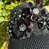 CLOSER LOOK AT OUR BIJOUX CAP AND DETAILS ON THE FLOWER WITH RHINESTONES.