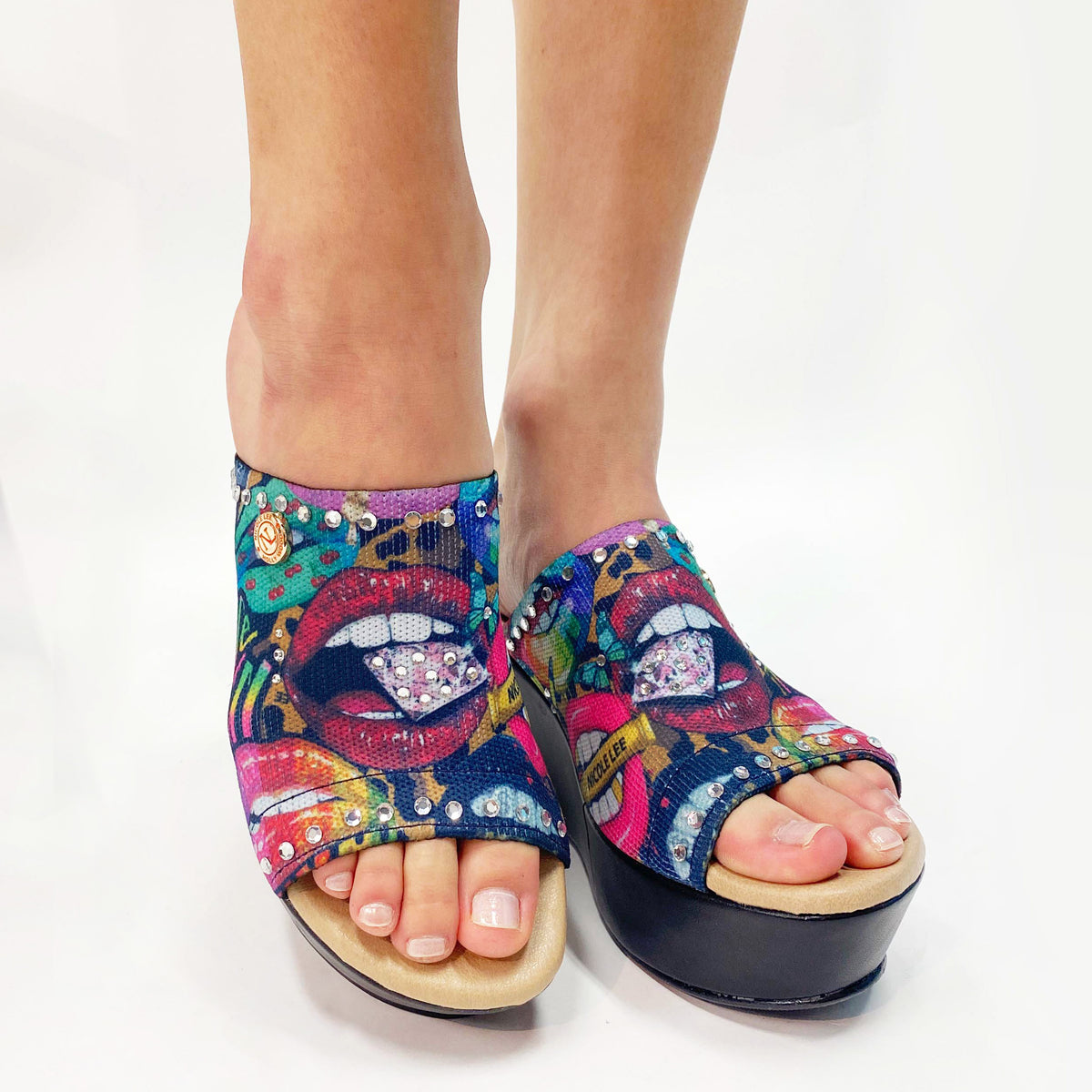 WEARING OUR NICOLE LEE CASUAL WEDGE SANDALS IN OUR ALL EMOTIONS DESING.