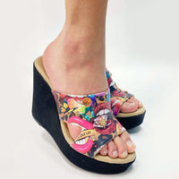 WEARING OUR NICOLE LEE CUTOUT WEDGE SANDALS IN OUR ALL EMOTION DESIGN.