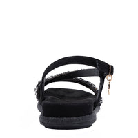 OUR DANI RHINESTONE SANDAL IN BLACK EMBELLISHED WITH A ADJUSTABLE BUCKLE CLOSURE. SUEDE UPPER AND INSOLE. OPEN TOE AND RUBBER OUTSOLE