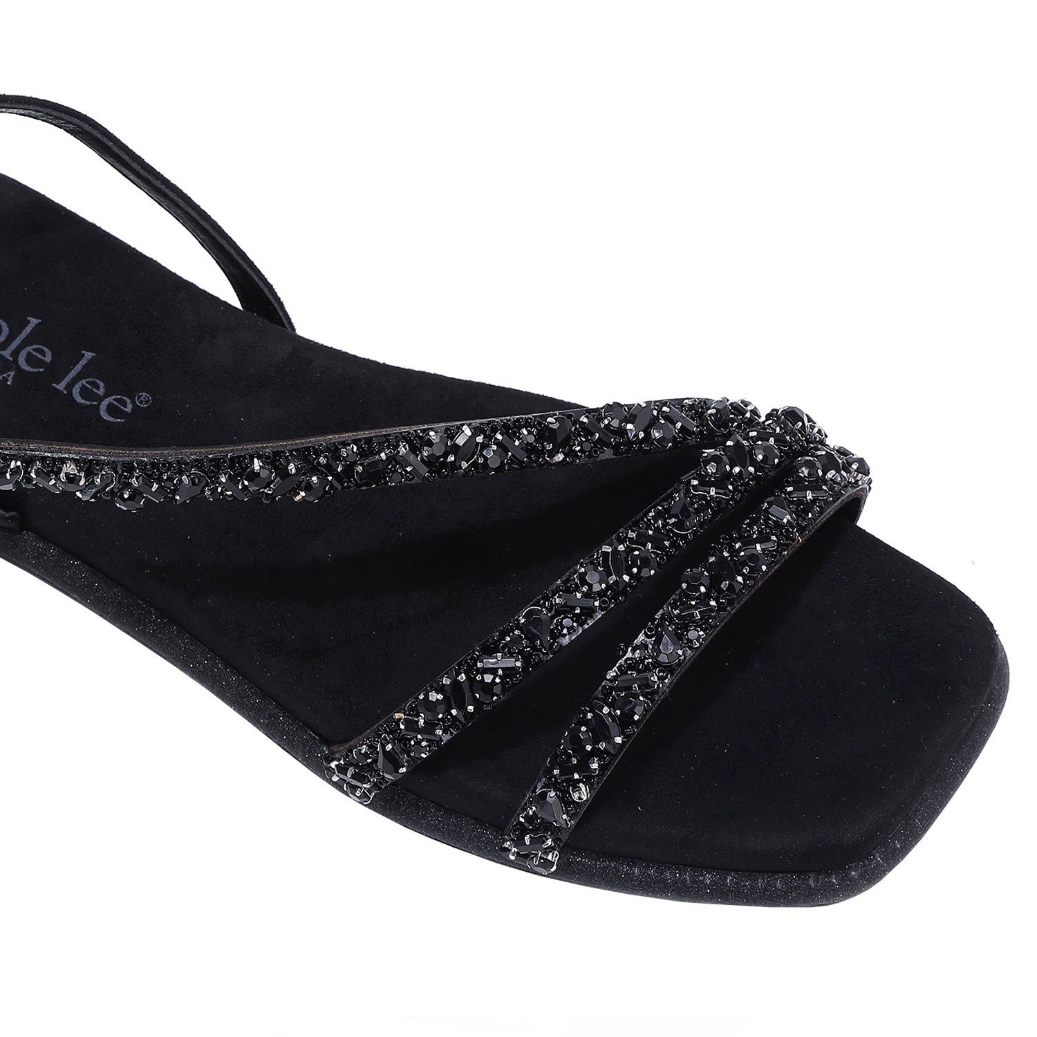A CLOSER LOOK ON OUR DANI SANDAL. RHINESTONE ENCRUSTED CRISSCROSS STRAPS AND A MODERN SQUARE TOE.