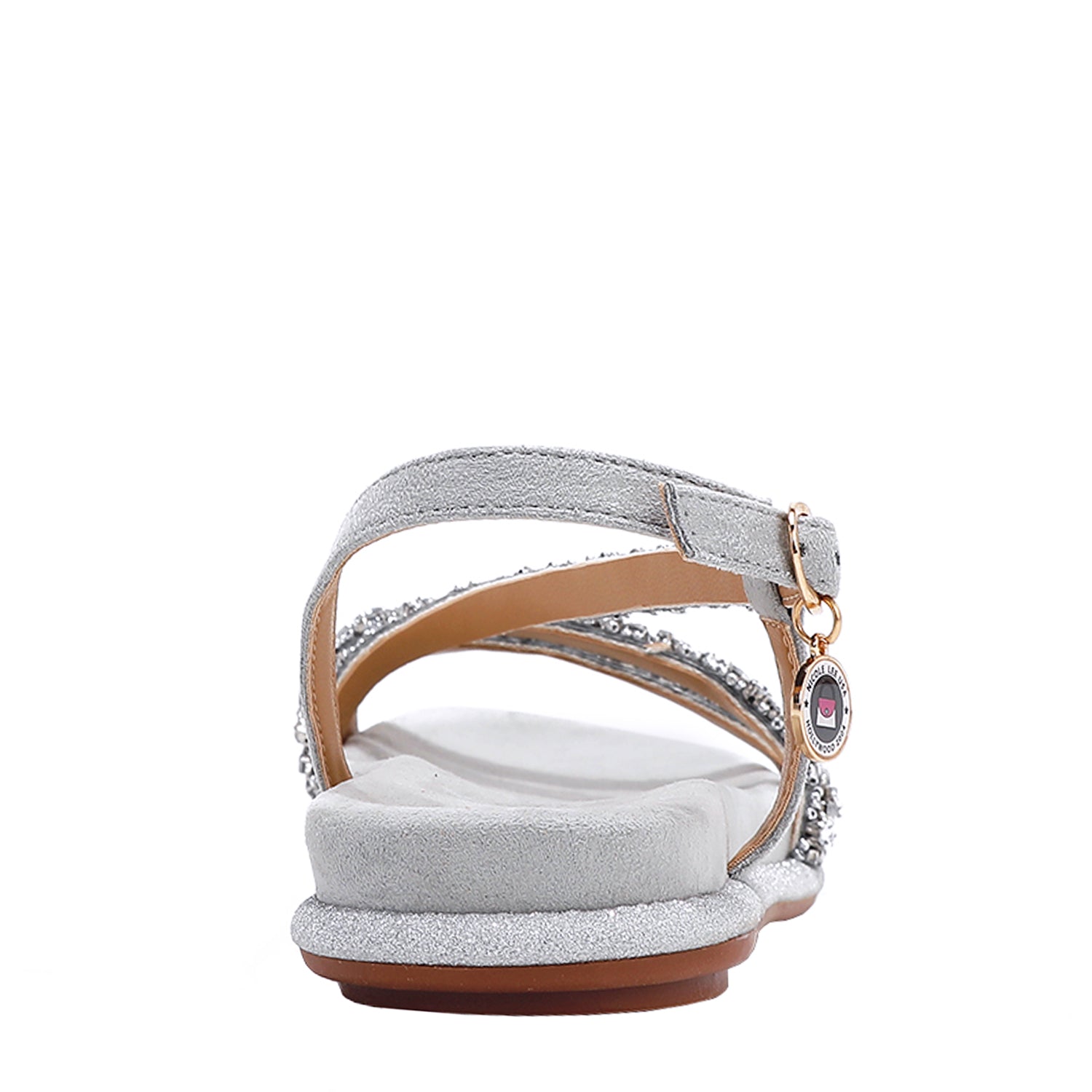 OUR DANI RHINESTONE SANDAL IN SILVER EMBELLISHED WITH A ADJUSTABLE BUCKLE CLOSURE. SUEDE UPPER AND INSOLE. OPEN TOE AND RUBBER OUTSOLE