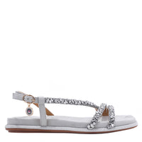 OUR DANI RHINESTONE SANDAL IN SILVER EMBELLISHED WITH A ADJUSTABLE BUCKLE CLOSURE WITH A NICOLE LEE CHARM FOR STATEMENT. SUEDE UPPER AND INSOLE. OPEN TOE AND RUBBER OUTSOLE