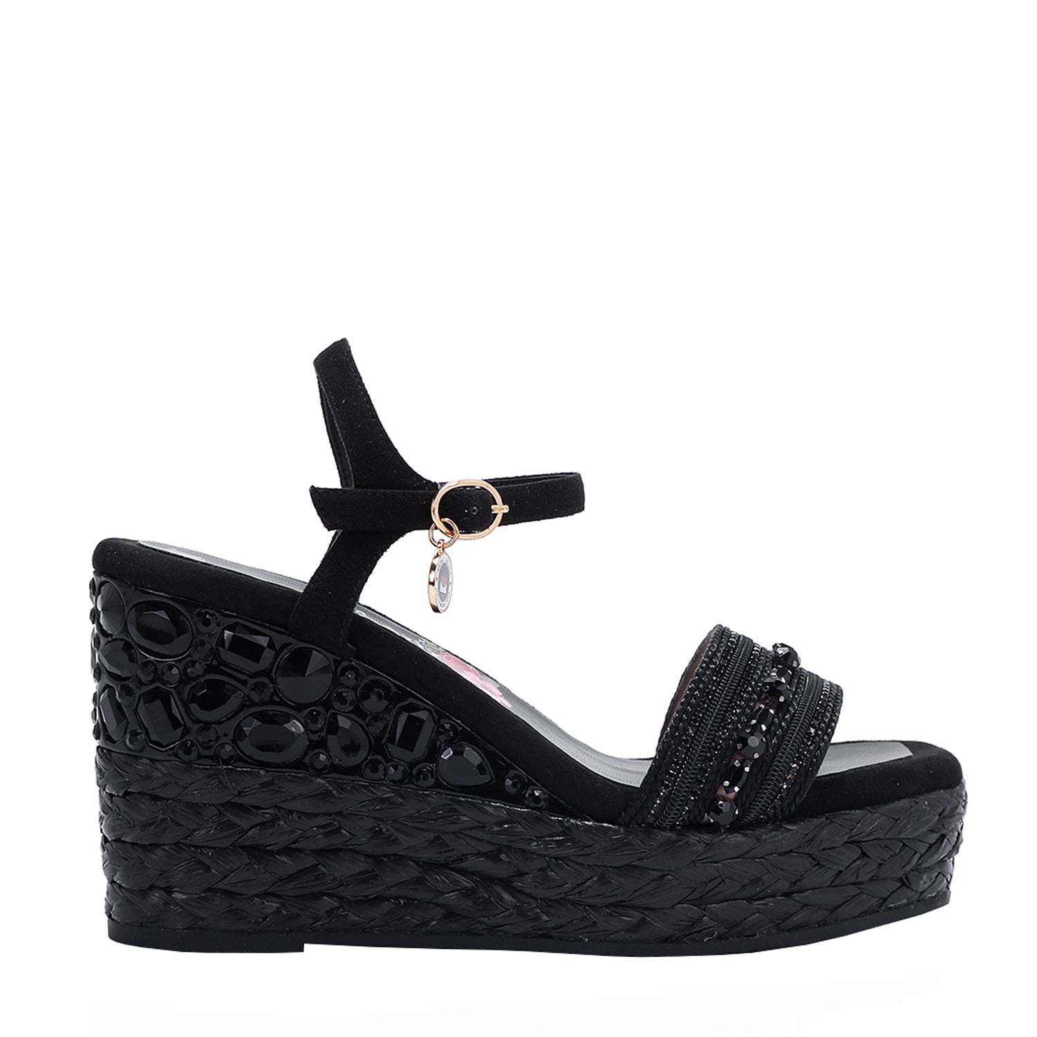 Kali Espadrille Wedge sandal in black.  Fitted with 1 adjustable buckle. The buckle has a small Nicole Lee Charm.The wedge is adorned with rhinestones and  braid detailing.