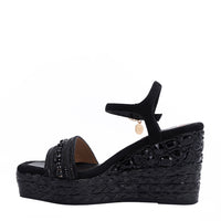 Kali Espadrille Wedge sandal in black.  Fitted with 1 adjustable buckle. The buckle has a small Nicole Lee Charm.The wedge is adorned with rhinestones and  braid detailing.