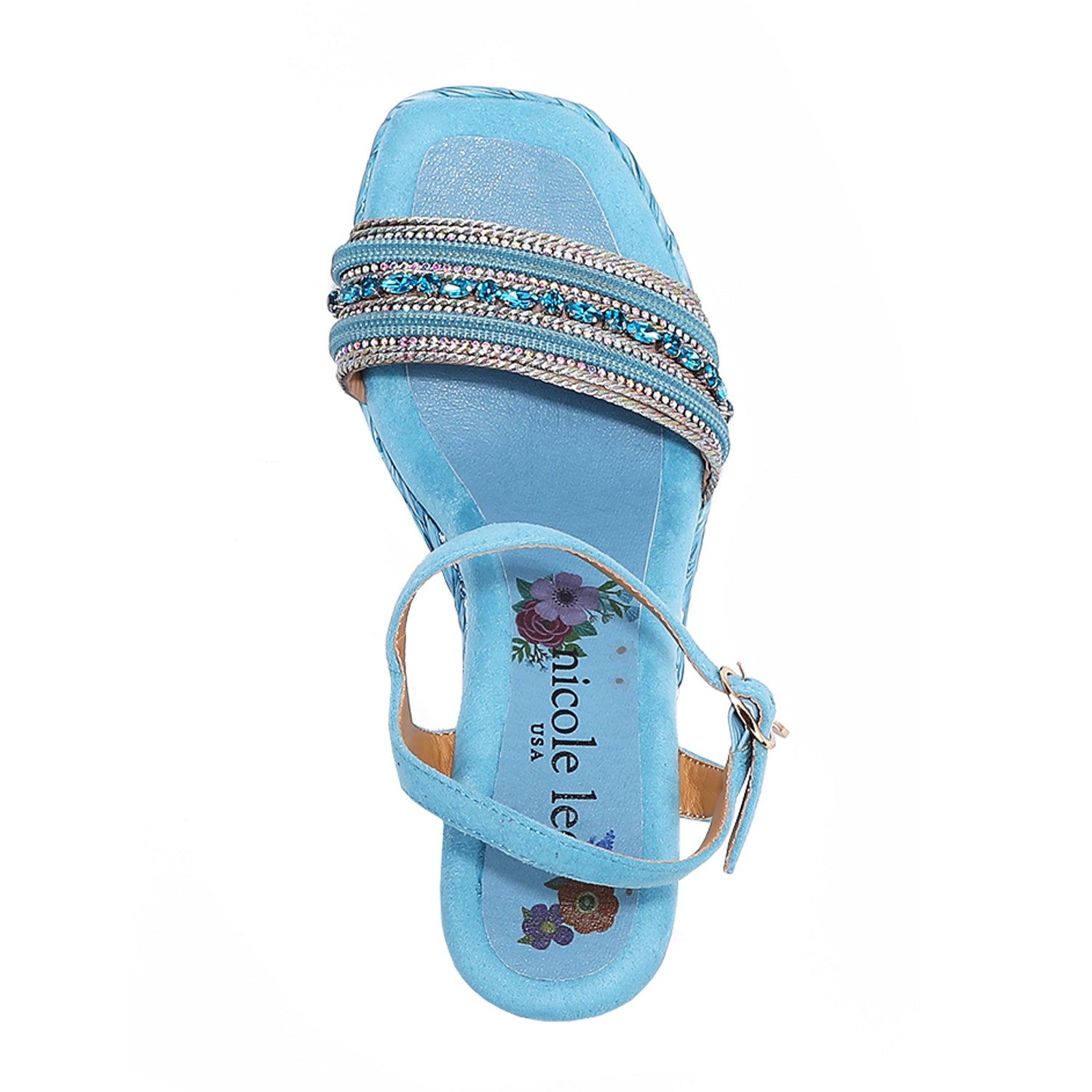 Kali Espadrille Wedge sandal in blue.  Fitted with 1 adjustable buckle. .The insole is purple with the Nicole Lee logo. The edge is velvet.