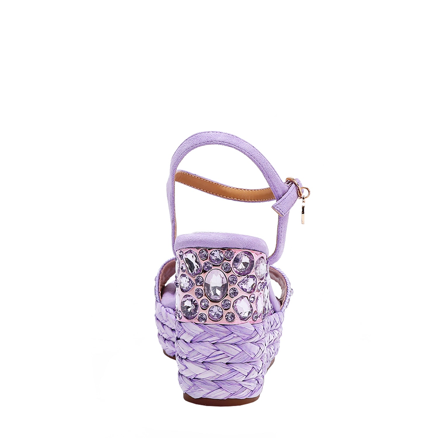 The platform wedge is adorned with purple rhinestones and  braid detailing.