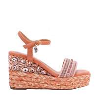 Kali Espadrille Wedge sandal in pink.  Fitted with 1 adjustable buckle. The buckle has a small Nicole Lee Charm.The wedge is adorned with rhinestones and  braid detailing.