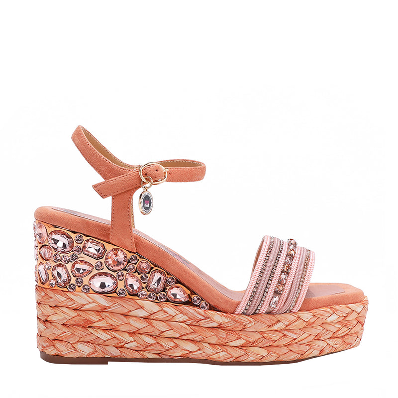 Kali Espadrille Wedge sandal in pink.  Fitted with 1 adjustable buckle. The buckle has a small Nicole Lee Charm.The wedge is adorned with rhinestones and  braid detailing.
