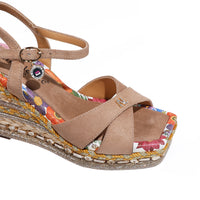 BONNIE ESPADRILLE WEDGE SANDAL THE CRISSCROSS STRAPS WITH THE NL INITIALS IN THE MIDDLE. THE BEIGE INSOLE WITH FLORAL PRINT ON THE EDGES.