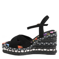 BONNIE ESPADRILLE WEDGE SANDAL IN BLACK COLOR. FEATURING A STUNING  MIX OF  MATERIAL SUCH AS WOVEN, RHINESTONES AND FLORAL PRINT ON HE EDGE OF THE INSOLE. CRISSCROSS SUEDE STRAPS. ADJUSTABLE ANKLE STRAP WITH A NICOLE LEE CHARM. 