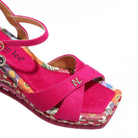 BONNIE ESPADRILLE WEDGE SANDAL THE CRISSCROSS STRAPS WITH THE NL INITIALS IN THE MIDDLE. THE HOTPINK INSOLE WITH FLORAL PRINT ON THE EDGES.