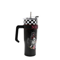 STAINLESS STEEL BLACK TUMBLER  WITH A HANDLE AND SILVER STRAW.